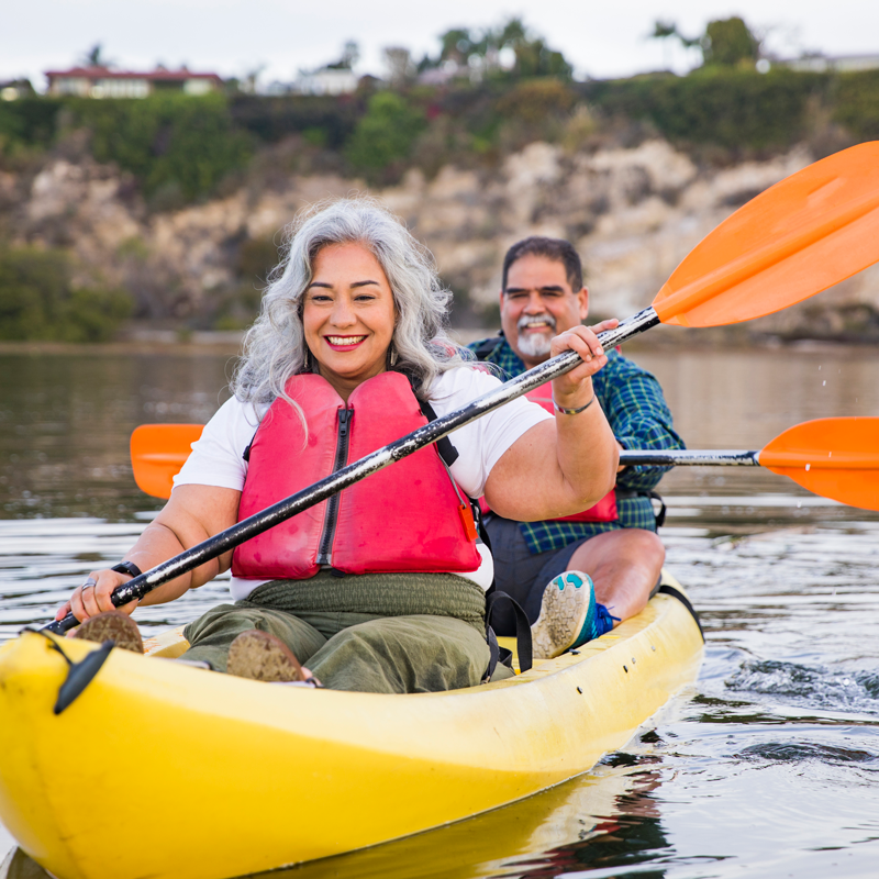 Senior Mexican couple kayaking